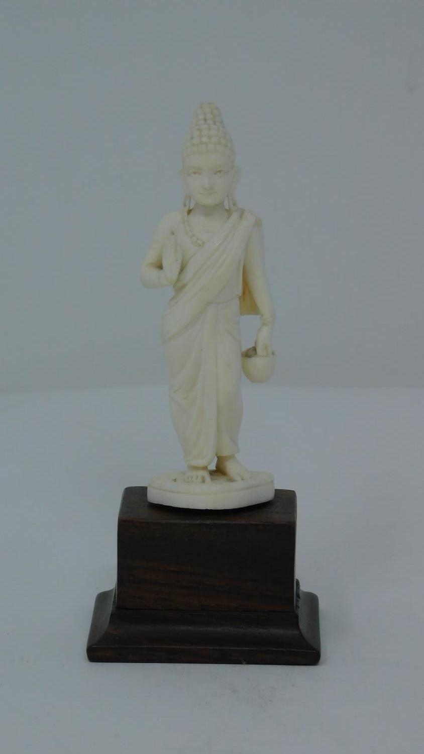 Two antique ivory carved statues, one of the buddha and one of a Hindu deity depicted holding a - Image 2 of 11