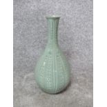 A 20th century Korean celadon glaze ceramic hand painted white flower bottle vase. Lotus petal