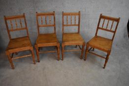 A set of four late 19th century beech framed dining chairs with panel seats. H.90x45cm