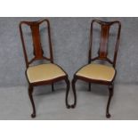 A pair of Edwardian mahogany and satinwood inlaid dining chairs on cabriole supports. H.97cm