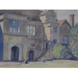 A framed and glazed watercolour depicting an old manor house. Indistinctly signed. 44x52cm