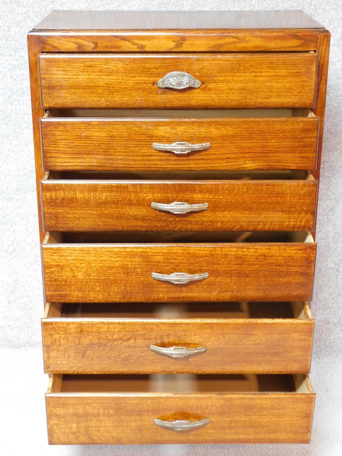 A vintage mid 20th century oak chest of six drawers on bracket feet. H.120 W.75 D.40cm - Image 3 of 5