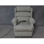 A Leggett & Platt reclining armchair with fully motorised back and footrest. H.103cm