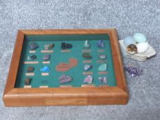 A box framed and glazed set of African mineral samples from Nchanga, Zambia, two polished stone