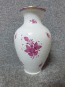 A handpainted porcelain Herend Apponyi Chinese Bouquet Raspberry basket weave vase. With gilded