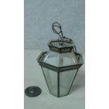 An antique style metal and glass lantern. 40x32cm