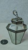 An antique style metal and glass lantern. 40x32cm