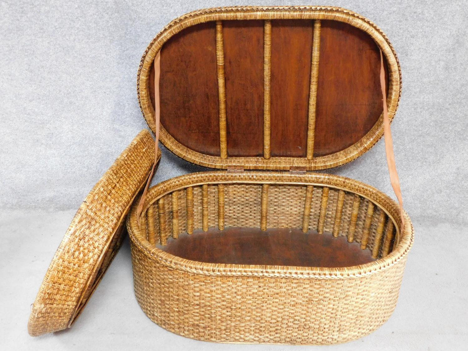 A wicker ottoman fitted with lift out tray by Oka. H.46 W.110 D.72cm - Image 3 of 6