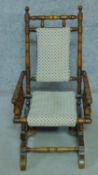 A 19th century American style turned beech child's rocking armchair. H.73cm