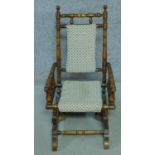 A 19th century American style turned beech child's rocking armchair. H.73cm