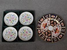 A Royal Crown Derby vintage Imari ware side plate along with a boxed set of four Haddon Hall