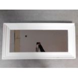 A white painted rectangular wall mirror. 125x62cm