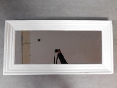 A white painted rectangular wall mirror. 125x62cm