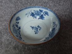 An 18th century Chinese blue and white porcelain bowl from the Nan King Cargo. Bowl on footring,