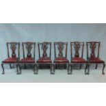 A set of six late 19th century mahogany Chippendale style dining chairs on cabriole supports