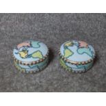A pair of ceramic Tiffany and Co world map design jewellery/trinket boxes with gilded edges. Stamped