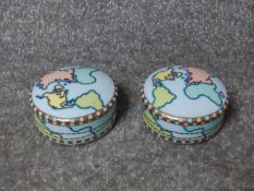 A pair of ceramic Tiffany and Co world map design jewellery/trinket boxes with gilded edges. Stamped