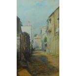A framed and glazed watercolour depicting a street in the South of France, by A. Ceysens. 51x61cm