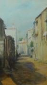 A framed and glazed watercolour depicting a street in the South of France, by A. Ceysens. 51x61cm