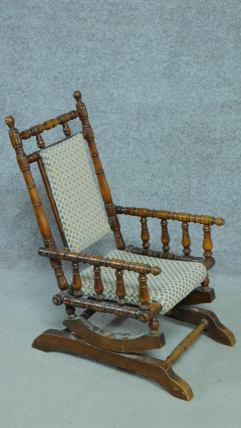 A 19th century American style turned beech child's rocking armchair. H.73cm - Image 2 of 3