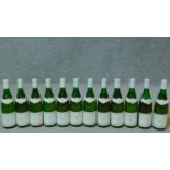 Twelve bottles of 1985 Chassagne Montrachet premier cru, domaine Vincent Gerardin.