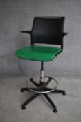 A contemporary adjustable swivel office chair. H.115cm