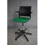 A contemporary adjustable swivel office chair. H.115cm