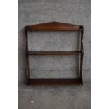 A set of 19th century mahogany open hanging wall shelves. H.56x50cm