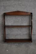 A set of 19th century mahogany open hanging wall shelves. H.56x50cm