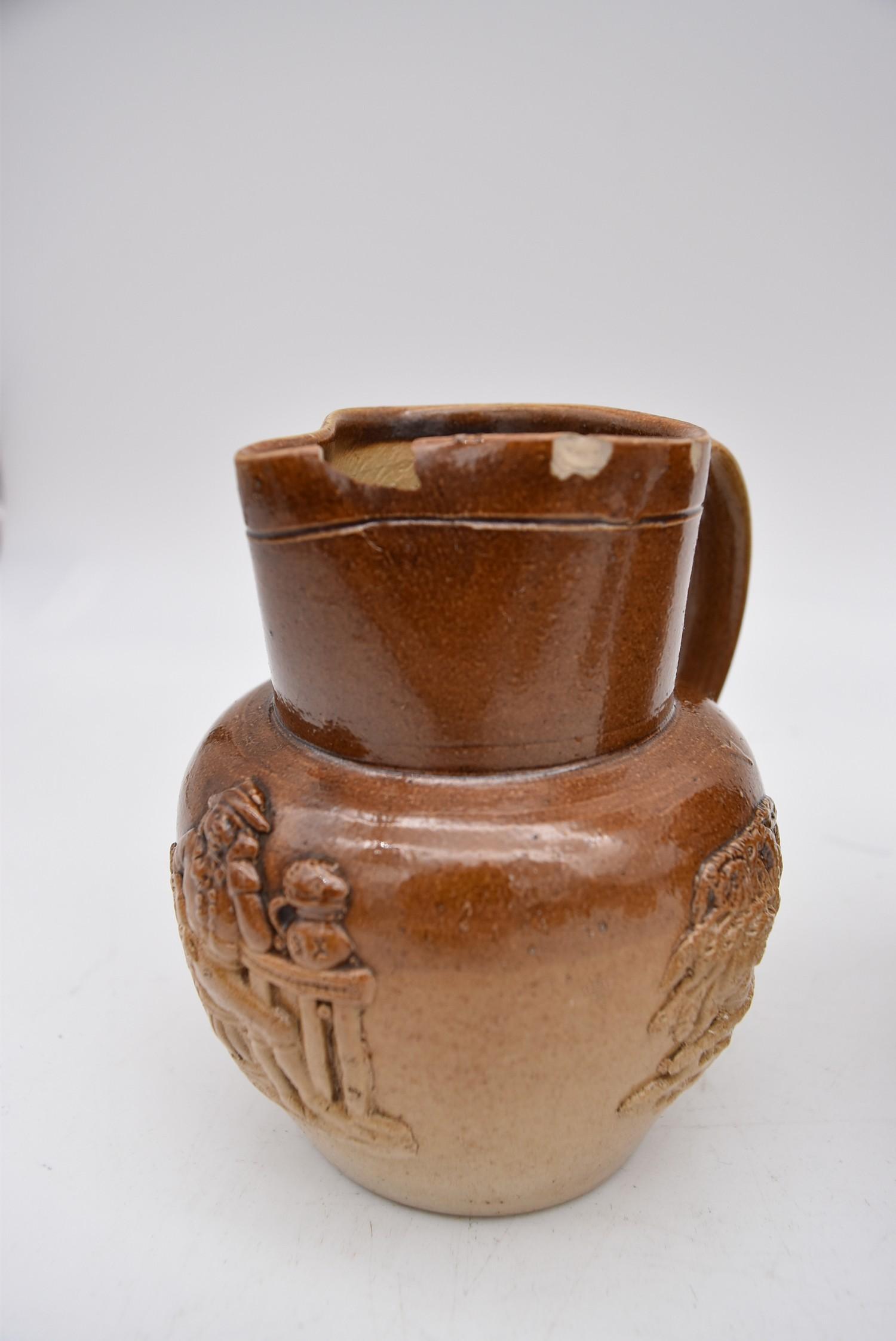 A collection of antique earthenware jugs and teapots and a hand painted porcelain oriental teapot. - Image 4 of 10