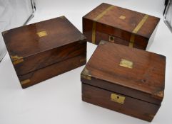 A 19th century brass bound walnut writing slope and two other similar boxes. H.15x35cm