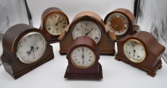 A miscellaneous collection of six mid 20th century mantel clocks. One by JW Benson of London. H.