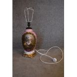 A large bulbous form French style bronze and ceramic table lamp base with decorative hand painted