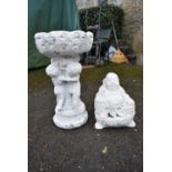 A stone bird bath and a stone seated buddha. H.56cm