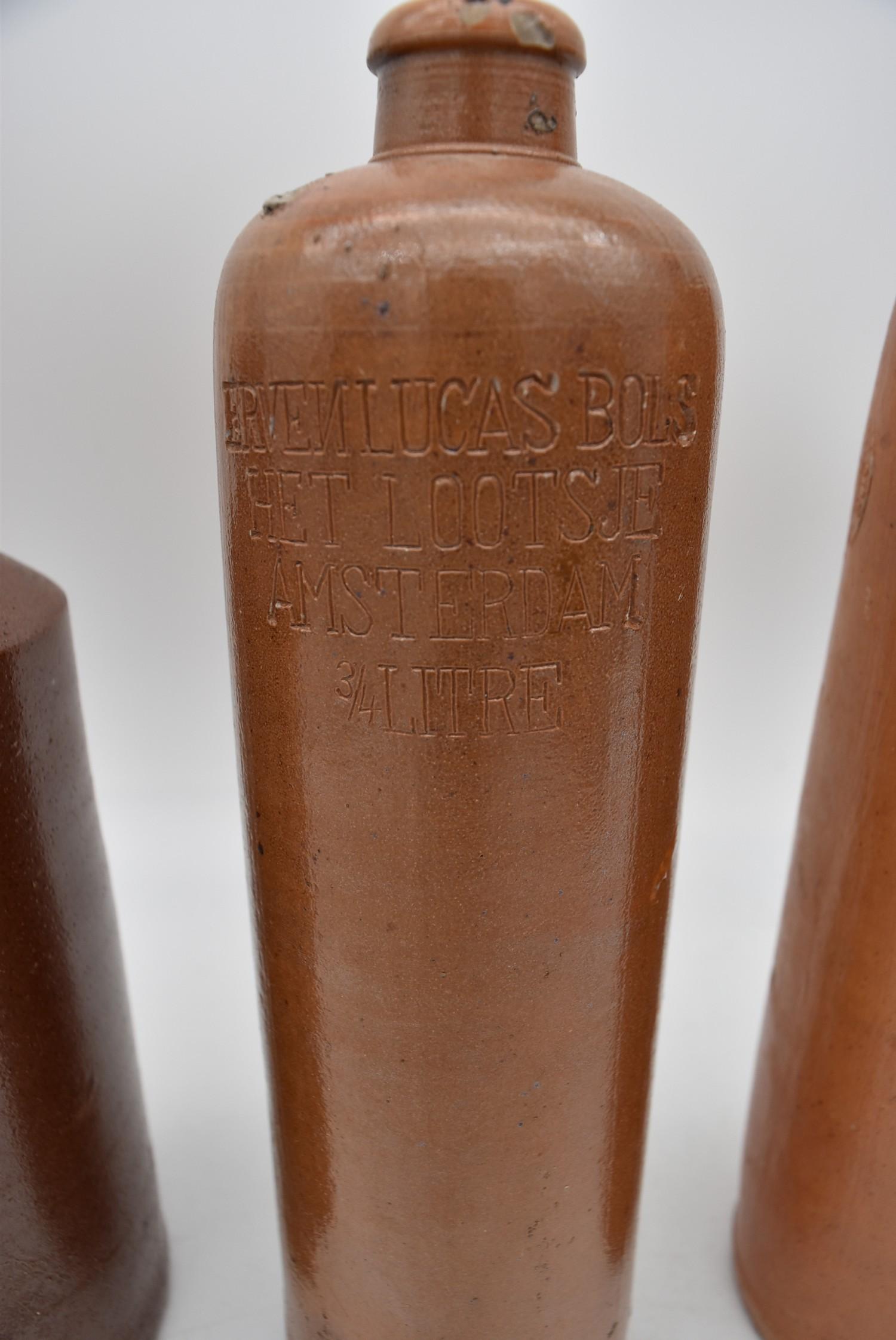 A collection of antique earthenware glazed bottles and jars, some with impressed makers marks. H. - Image 4 of 8