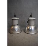 A pair of large industrial aluminium and metal spotlights. H.85xDia54cm