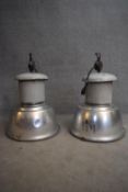 A pair of large industrial aluminium and metal spotlights. H.85xDia54cm