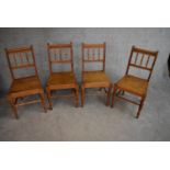 A set of four late 19th century beech framed dining chairs with panel seats. H.90x45cm