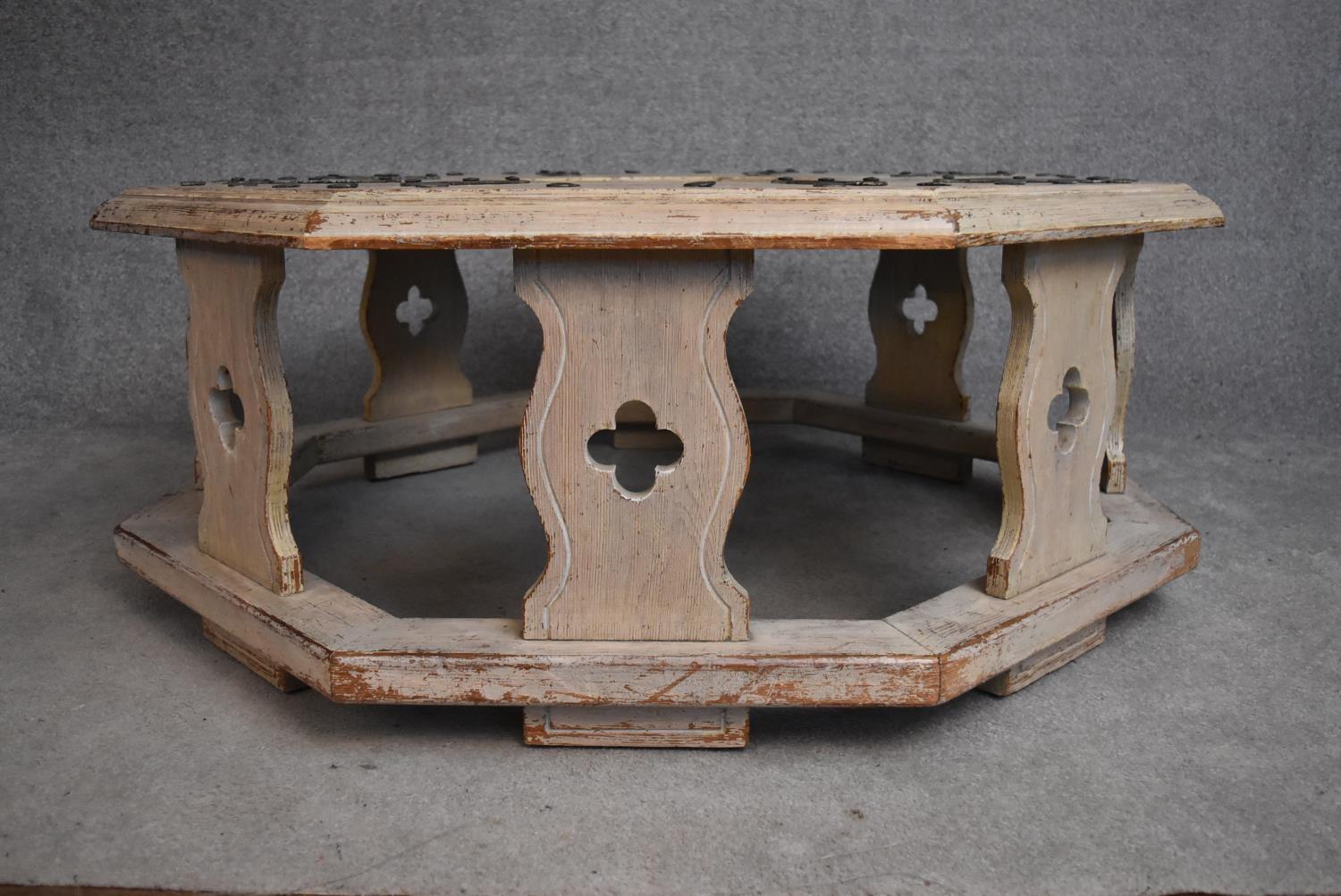 An Eastern distressed painted metal bound and studded octagonal table or garden seat with central - Image 2 of 4