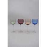 A set of four crystal coloured wine glasses. H.23cm