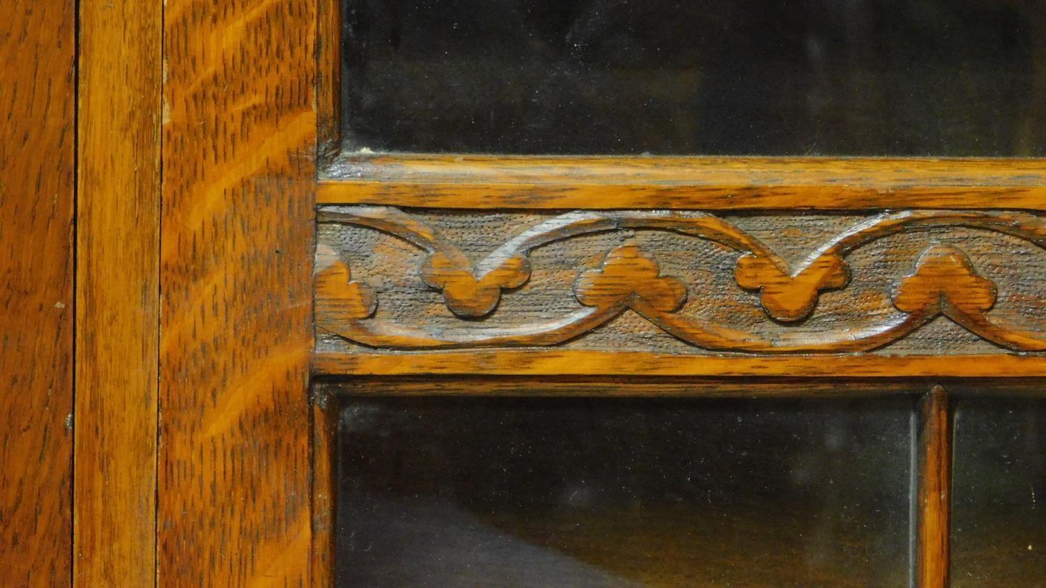 A mid 20th century carved oak bureau bookcase with central fitted secretaire section flanked by - Image 5 of 7