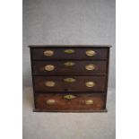A small Georgian Cuban mahogany chest of four long graduated drawers. H.67x76cm
