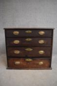 A small Georgian Cuban mahogany chest of four long graduated drawers. H.67x76cm