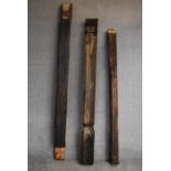 Three miscellaneous Eastern carved hardwood door pilasters. H.233cm