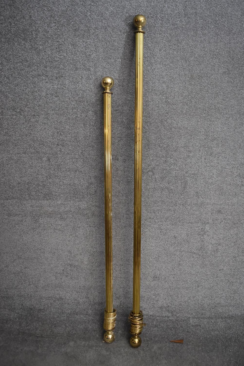 Two brass fluted curtain poles and rings with spherical finials. Longest L.165/Shortest L.138cm - Image 2 of 4