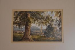 A framed and glazed watercolour, trees with cathedral in distance, unsigned. H.33x40cm