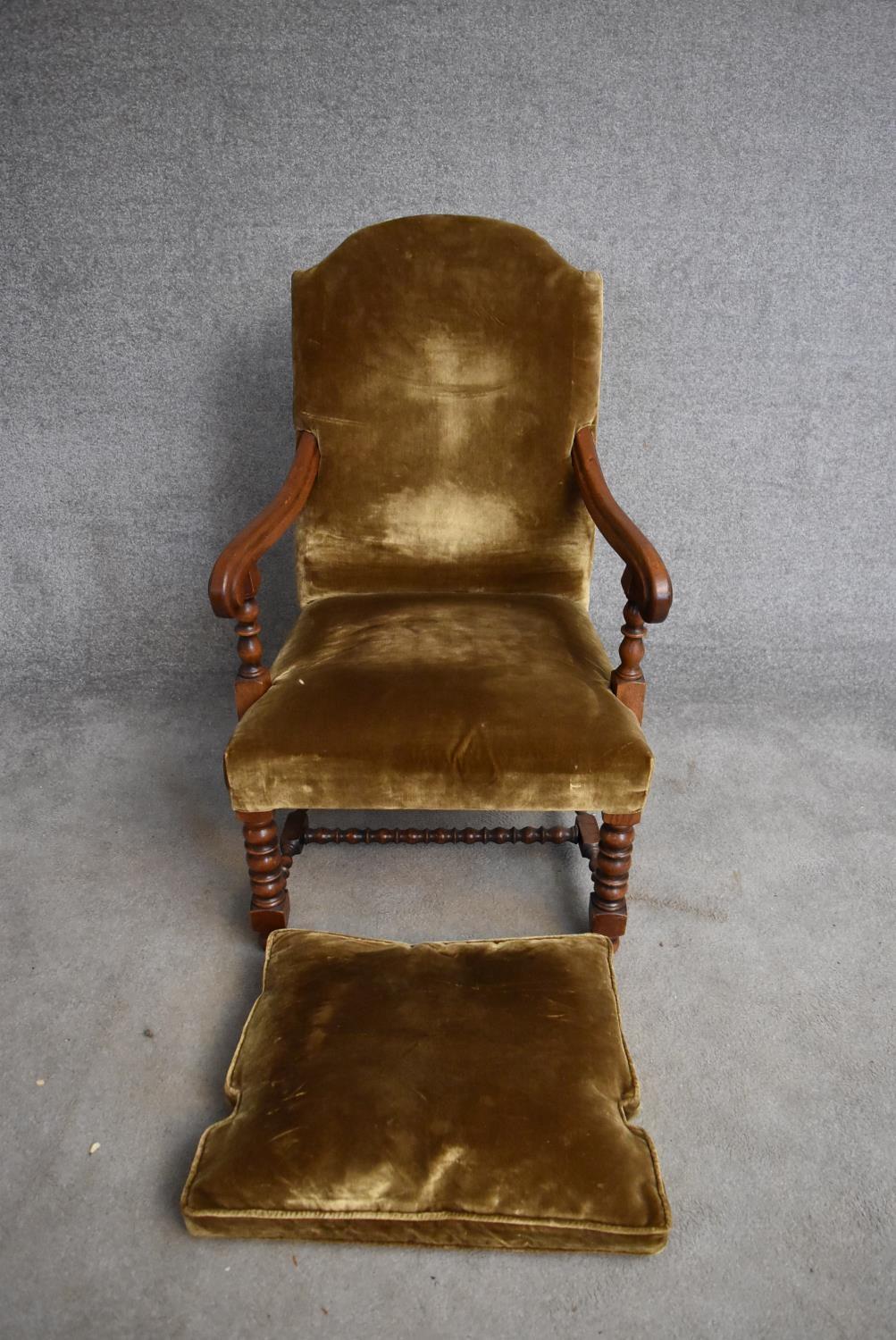 An oak framed antique style armchair with squab cushion on turned stretchered supports. H.100x65cm - Image 4 of 4