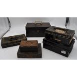A 19th century heavy metal strong box with brass carrying handle and key and a collection of five