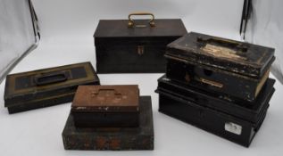 A 19th century heavy metal strong box with brass carrying handle and key and a collection of five