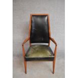 A 1960's vintage Danish teak and leather upholstered high back armchair. H.112x60cm